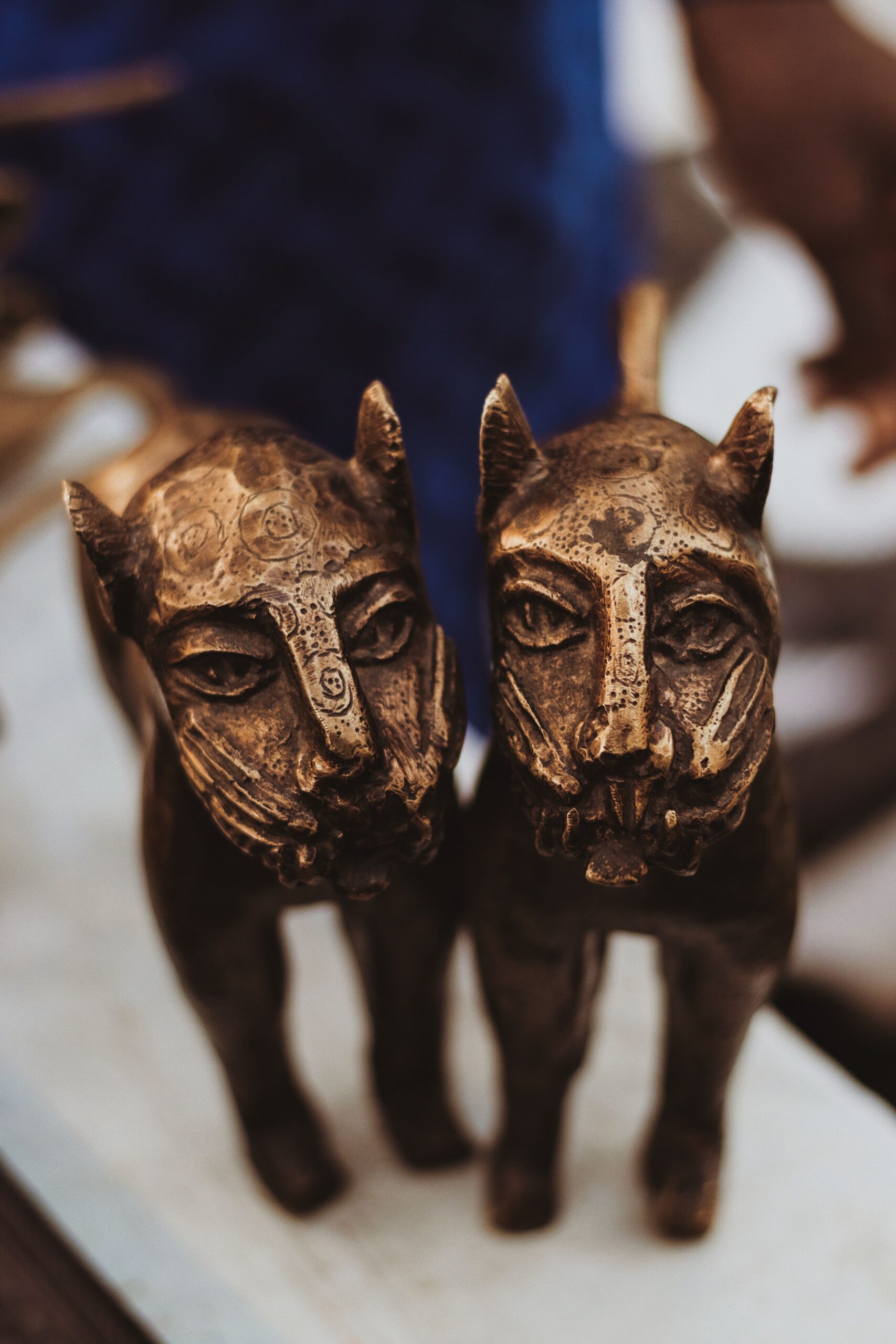 Bronze leopard figurines with intricate Nigerian designs, photo by Abdullahi Santuraki on Pexels