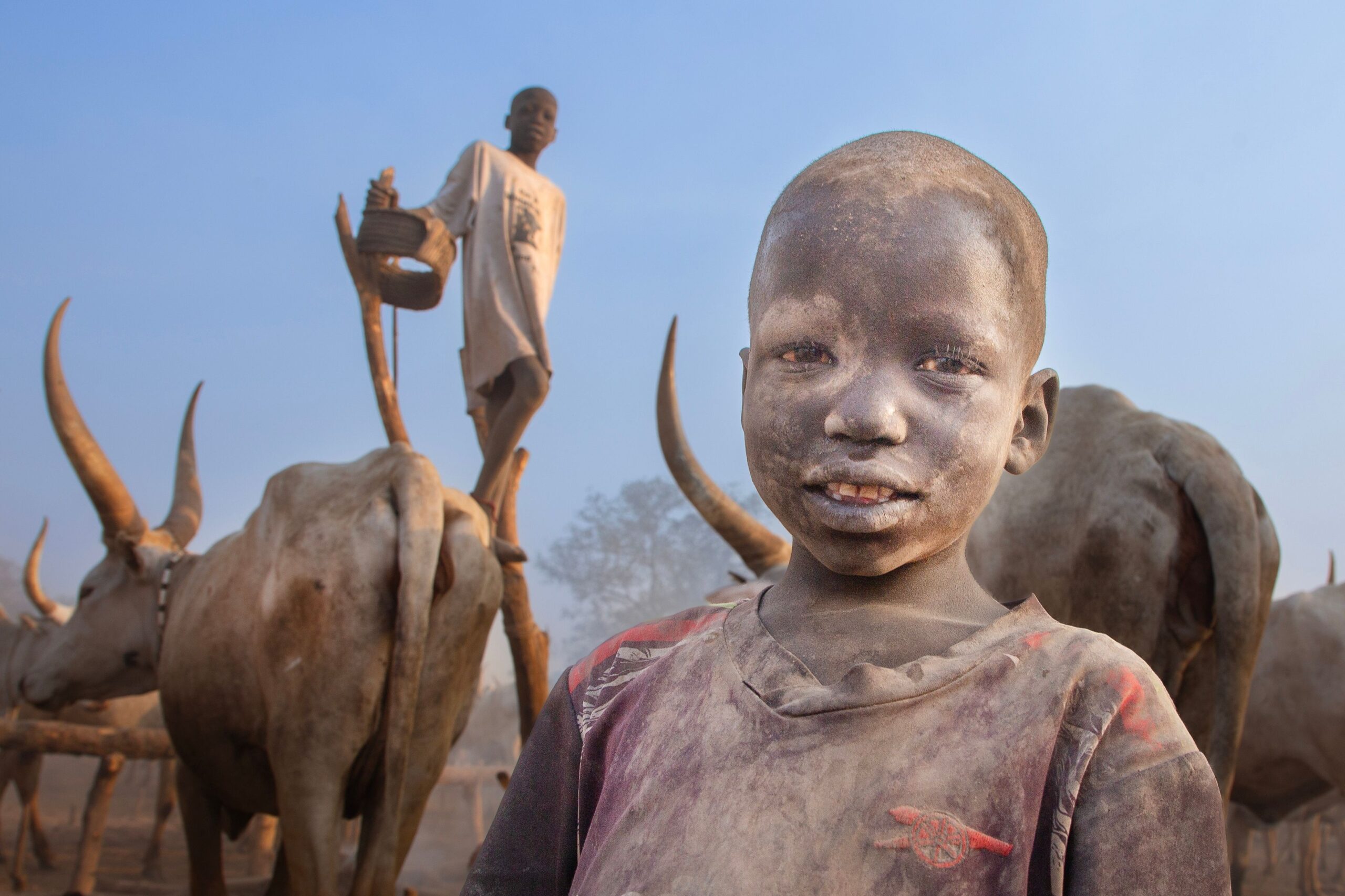 Dinka man in a cattle camp in South Sudan, photo by Mursel on Pexels