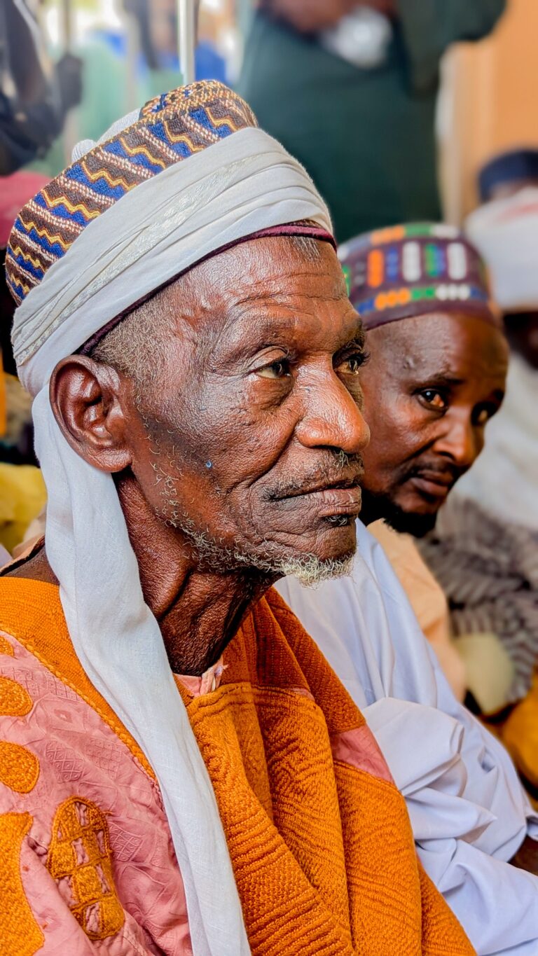 Traditional Nigerian elder in vibrant attire, photo by Ibrahim Gwaram Aliyu on Pexels