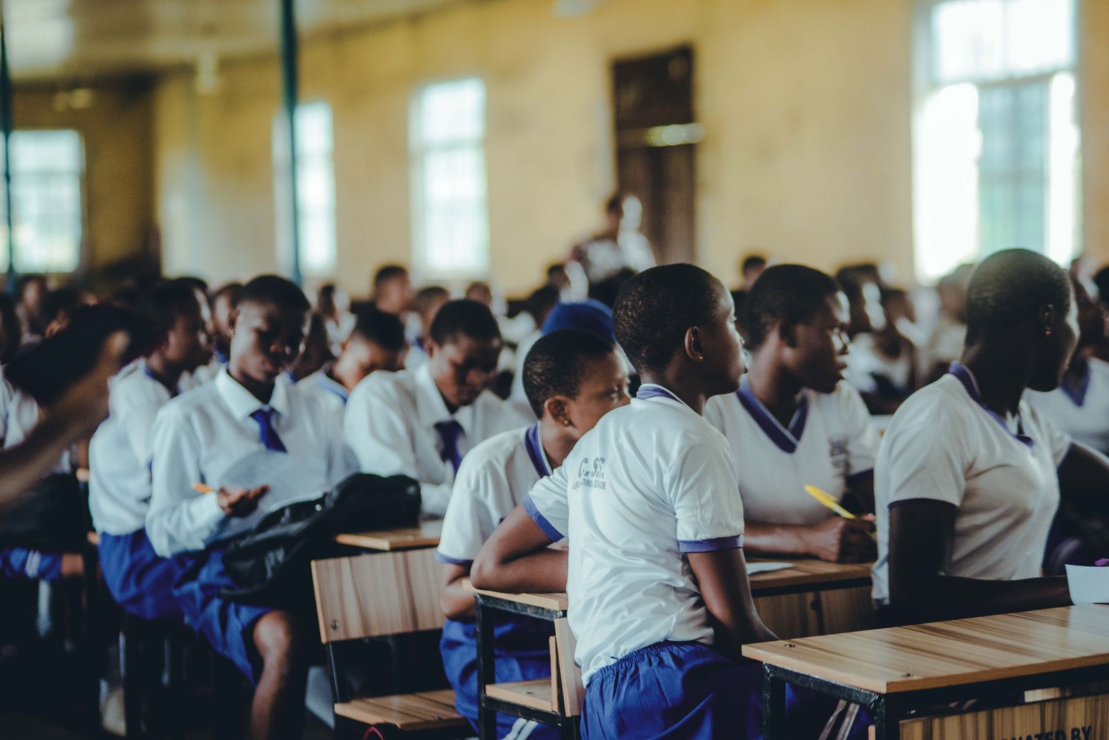 Students concentrating at their desks in a classroom in Accra, Ghana