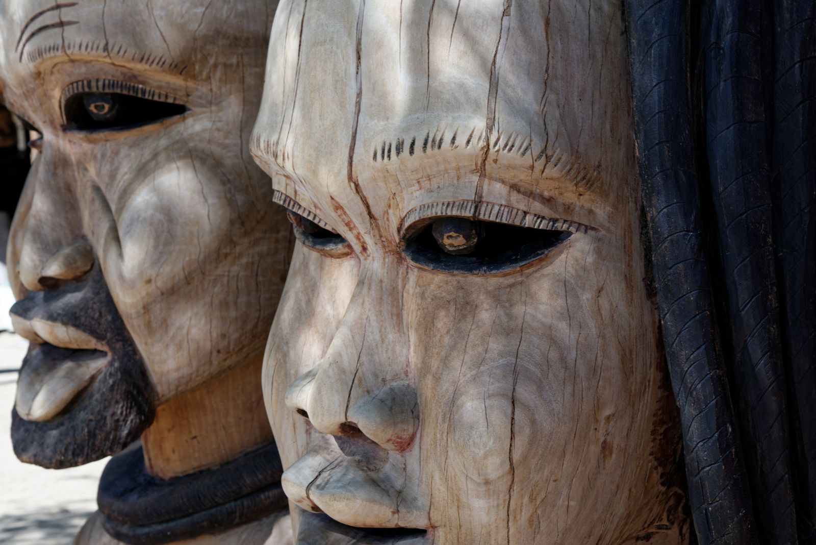 Close up of carved wooden African masks
