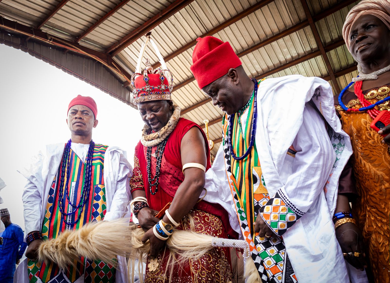 Chiefs in colorful traditional attire at a Nigerian cultural ceremony